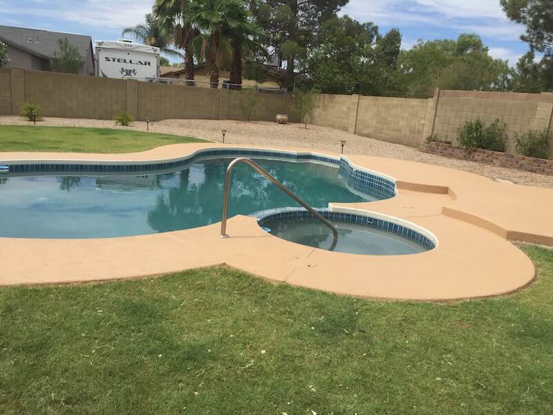 Restored pool and spa deck · wide project view